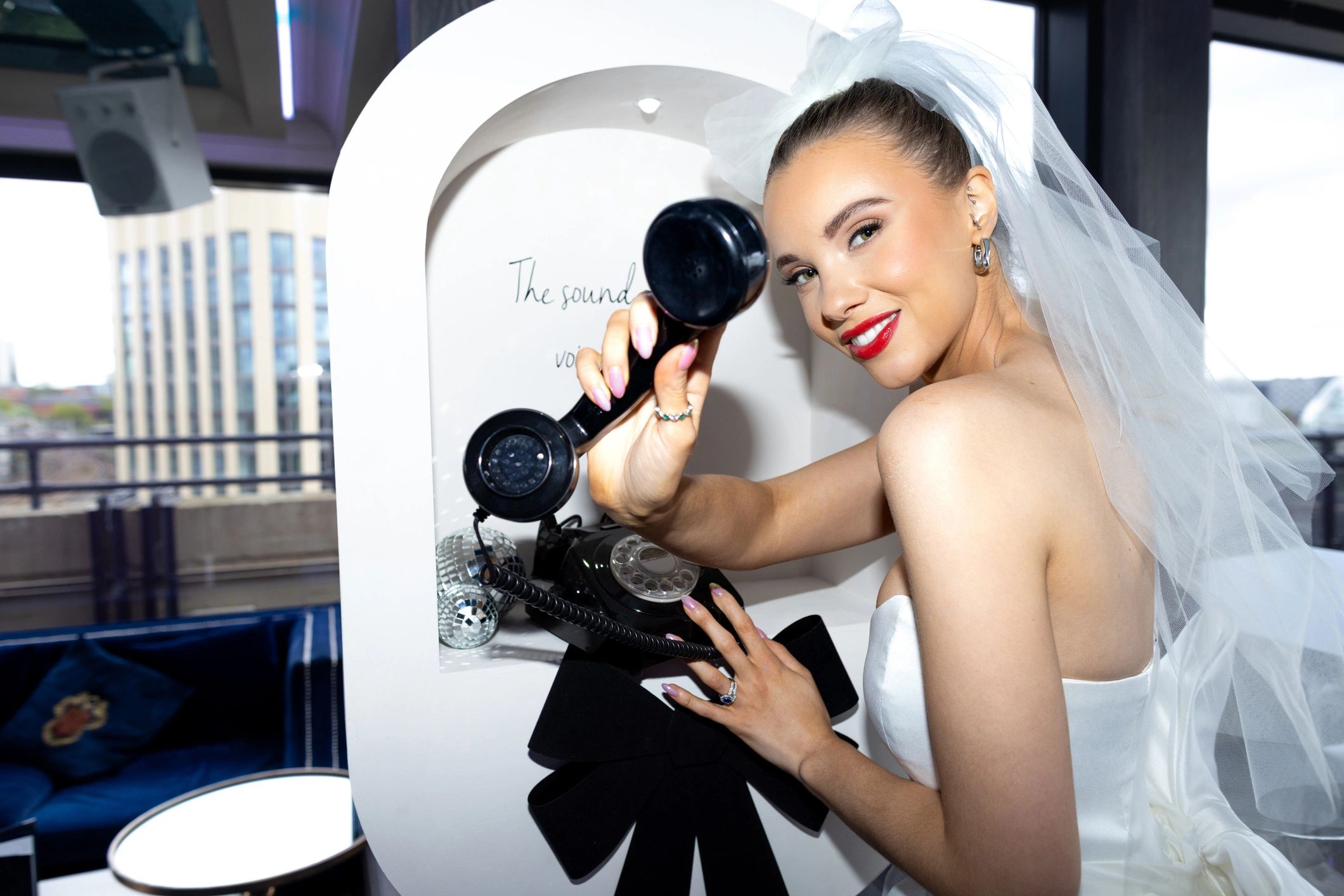 Bride wearing jewelry and smiling
