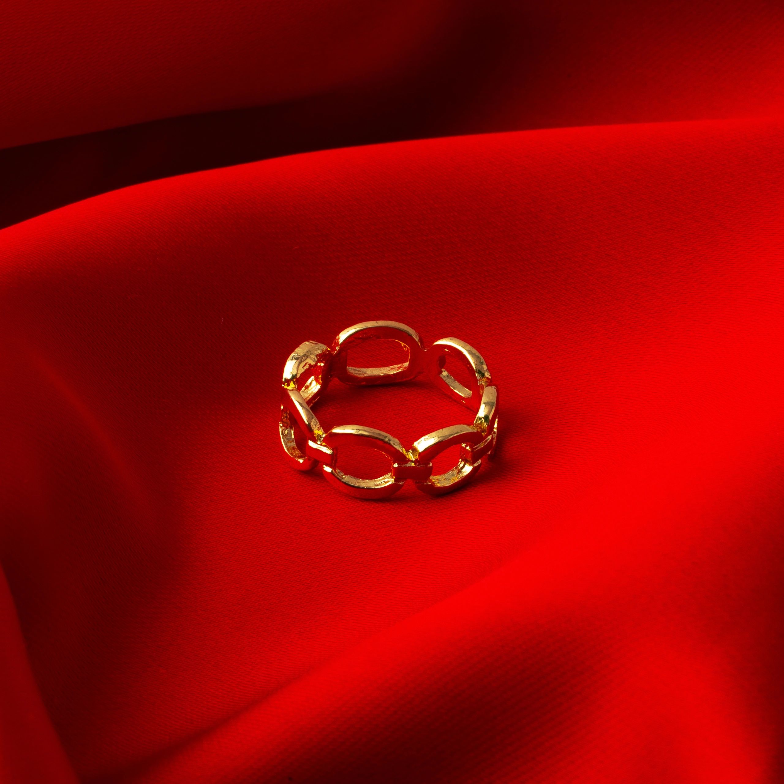Minimalist gold band ring product photo with refined luxury styling